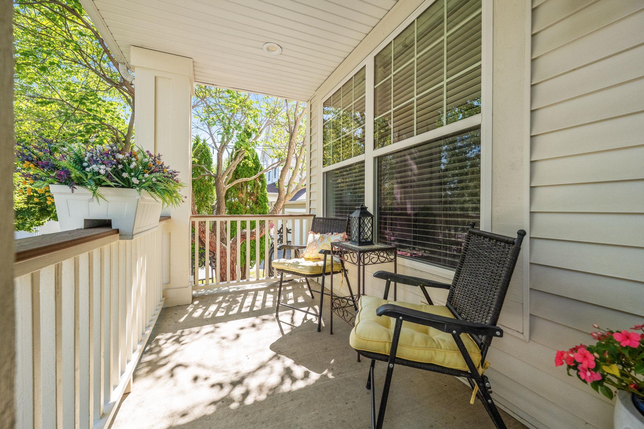 Enjoy morning coffee on your charming front porch!