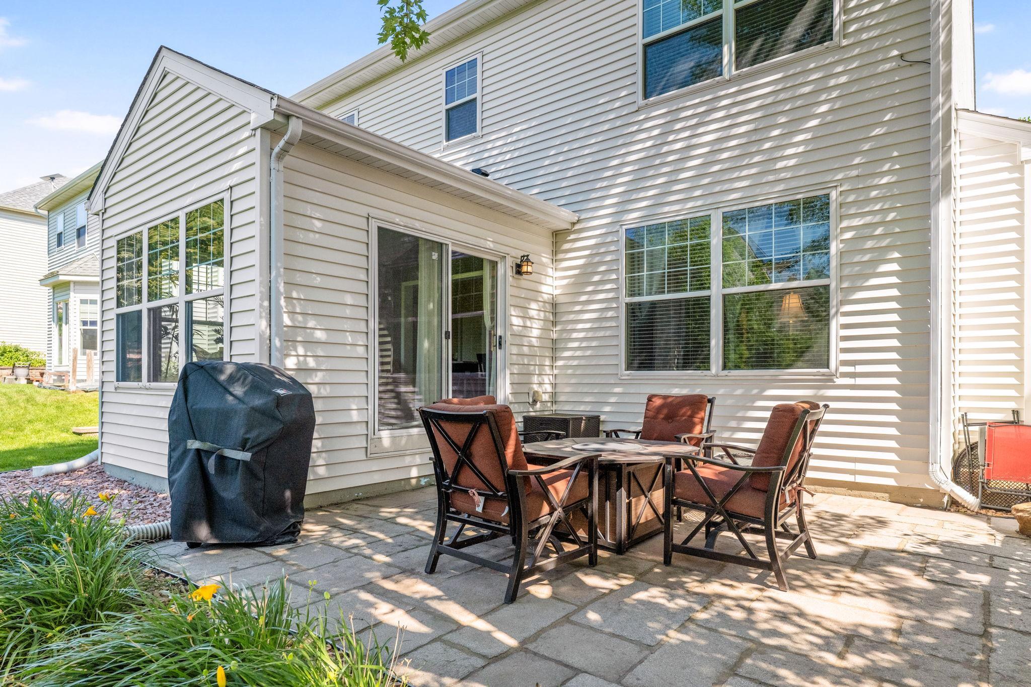 The back patio seamlessly connects indoor & outdoor living.