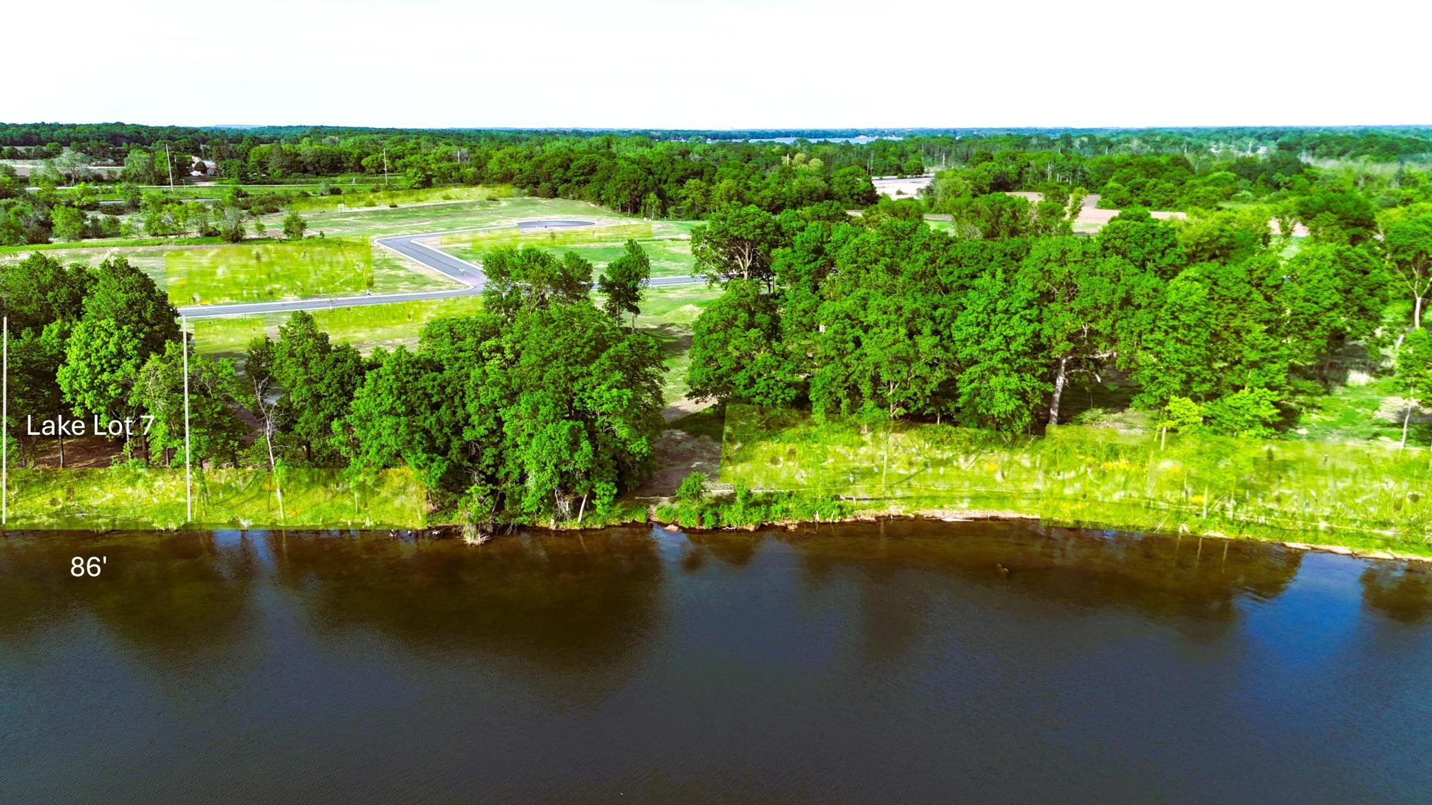 Level lakeshore, panoramic views, and oversized .55 acre level lot with mature trees.