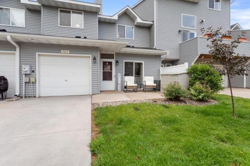 Welcome Home! Where you can enjoy your morning coffee everyday right on the front patio, with a privacy wall and shrubs it really feels like your own space!