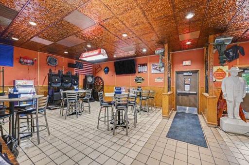 Combination of high tops and low seating to accommodate everyone's preferences