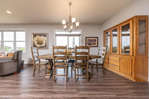 The large dining room opens to your own private outdoor oasis through the large sliding door