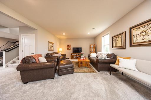 The recreation room in the lower level is designed with flexibility in mind. Here is one space being used as a family room