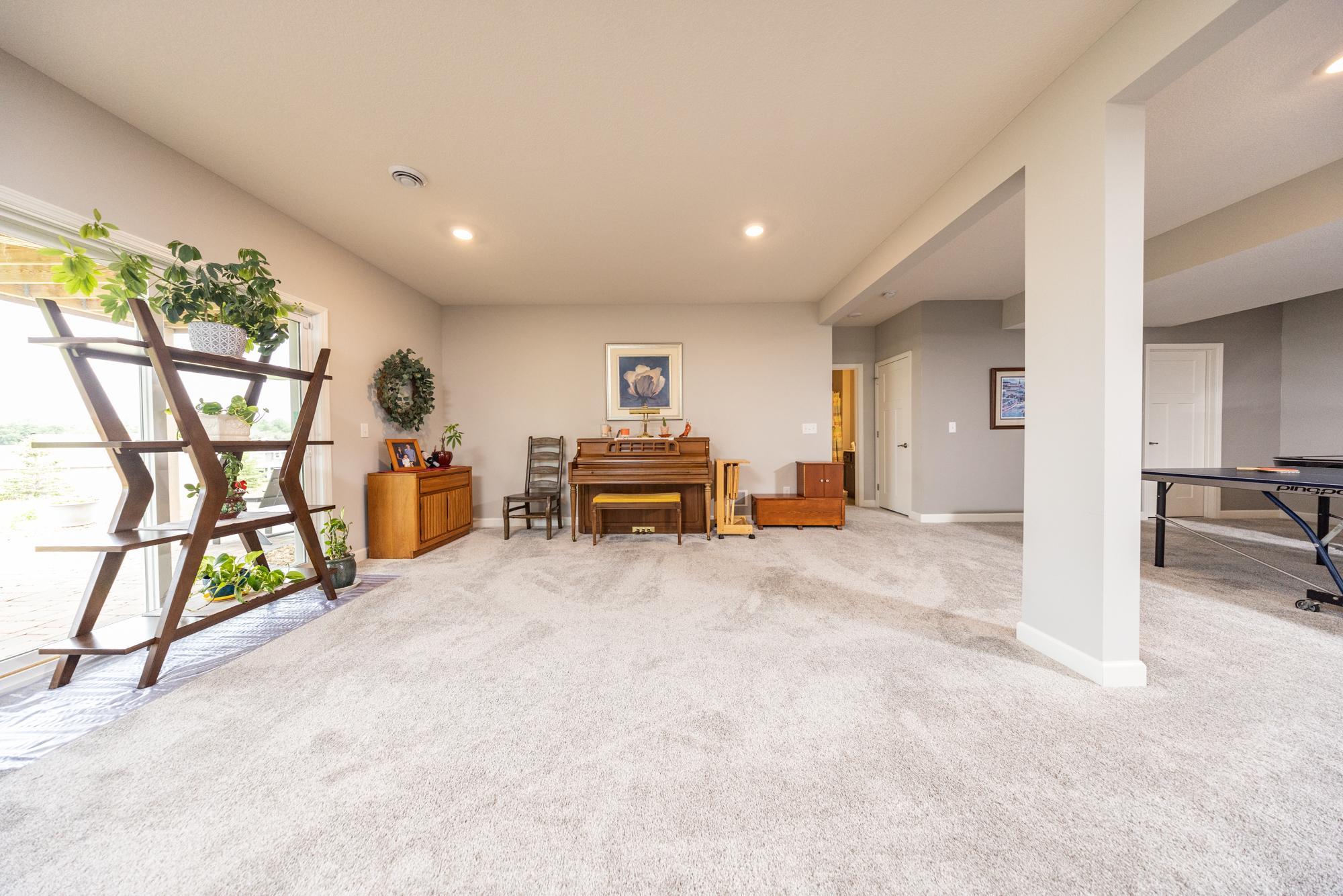 The lower level has a sliding door out to the stunning views from your private patio