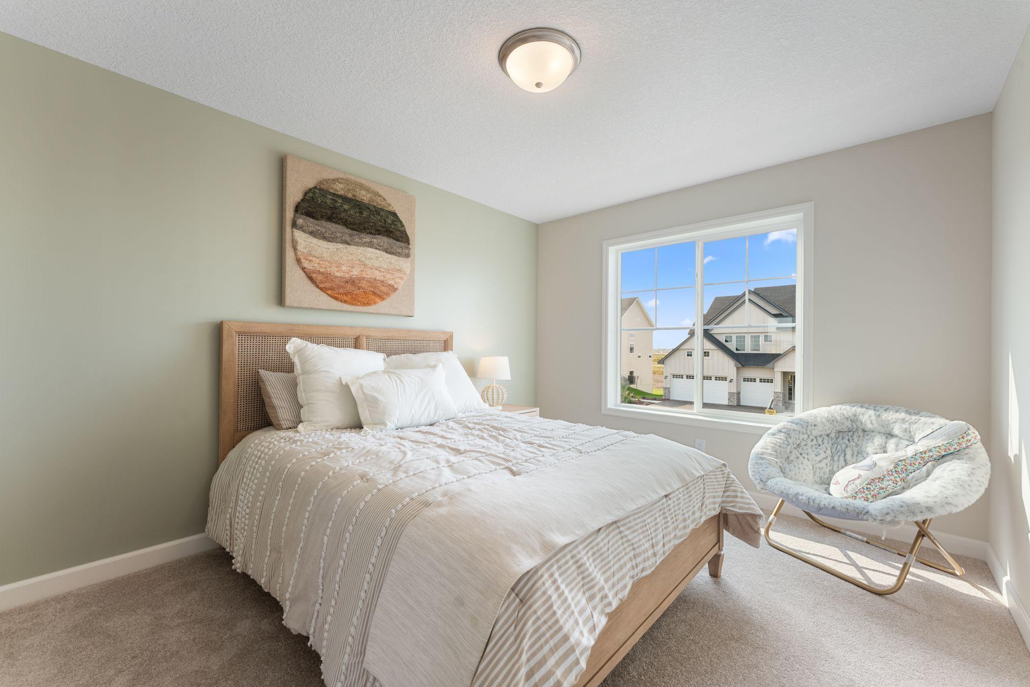Upper level bedroom 2 with walk-in closet