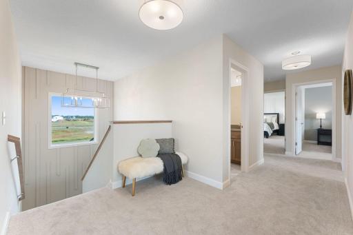 Upper level landing. Great use of space for sitting area or desk for homework/crafts