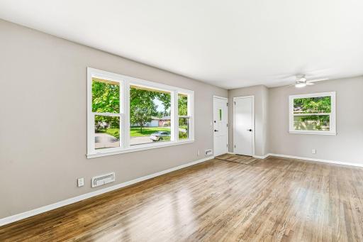 Living room provides enough space to incorporate a dining area!
