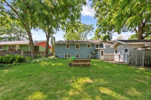 Partially fenced in spacious back yard