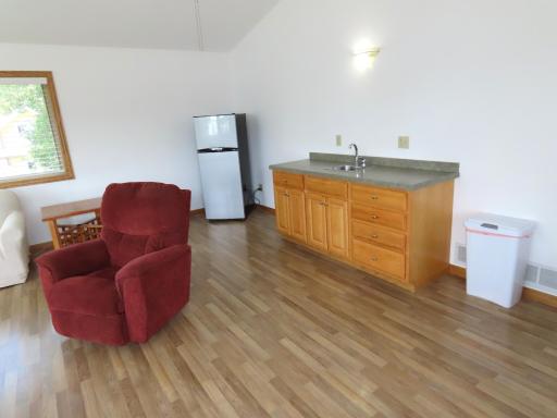 There is a wet bar in the back of the family room