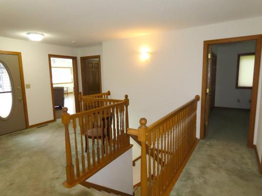 Top of the stairs/ Family room to the left