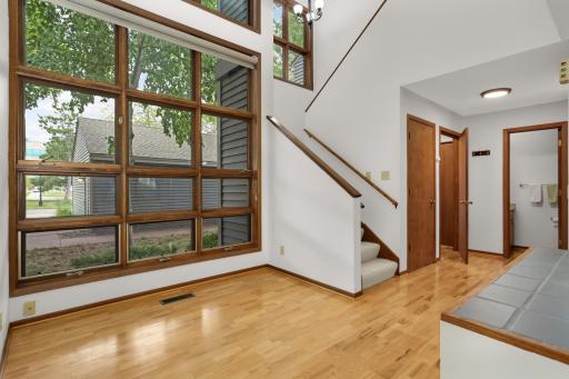 The cool sunroom would make a great office space or sitting area
