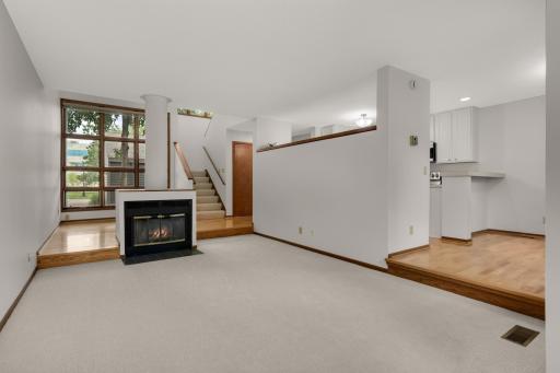 Charming woodburning fireplace and a fabulous floor plan with lots of natural light