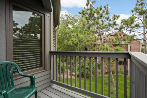 The deck off the primary bedroom has a really pretty view and is a peaceful place to sit and relax