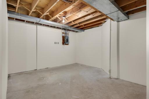 An addition area in the basement and there is a utility room for extra storeage also