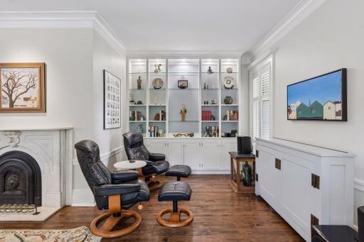 Custom AV throughout, this portion of living room has built-ins with Lutron lighting
