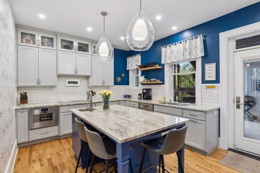Large kitchen island is a favorite gathering spot