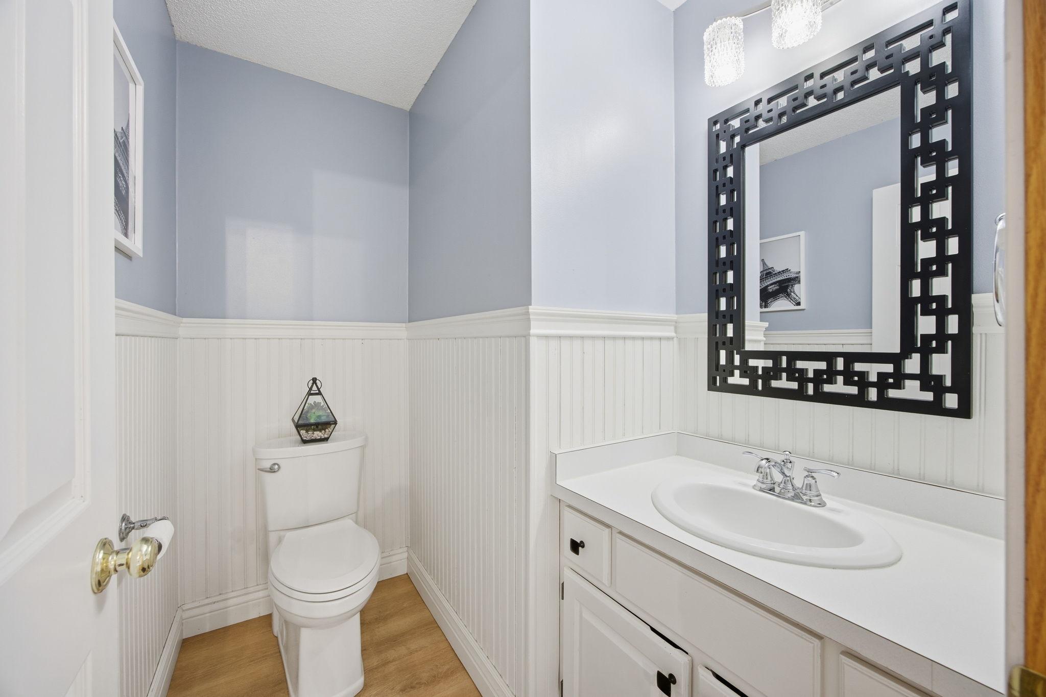 Main Level Half Bathroom 14325 Quince St NW Andover.jpg