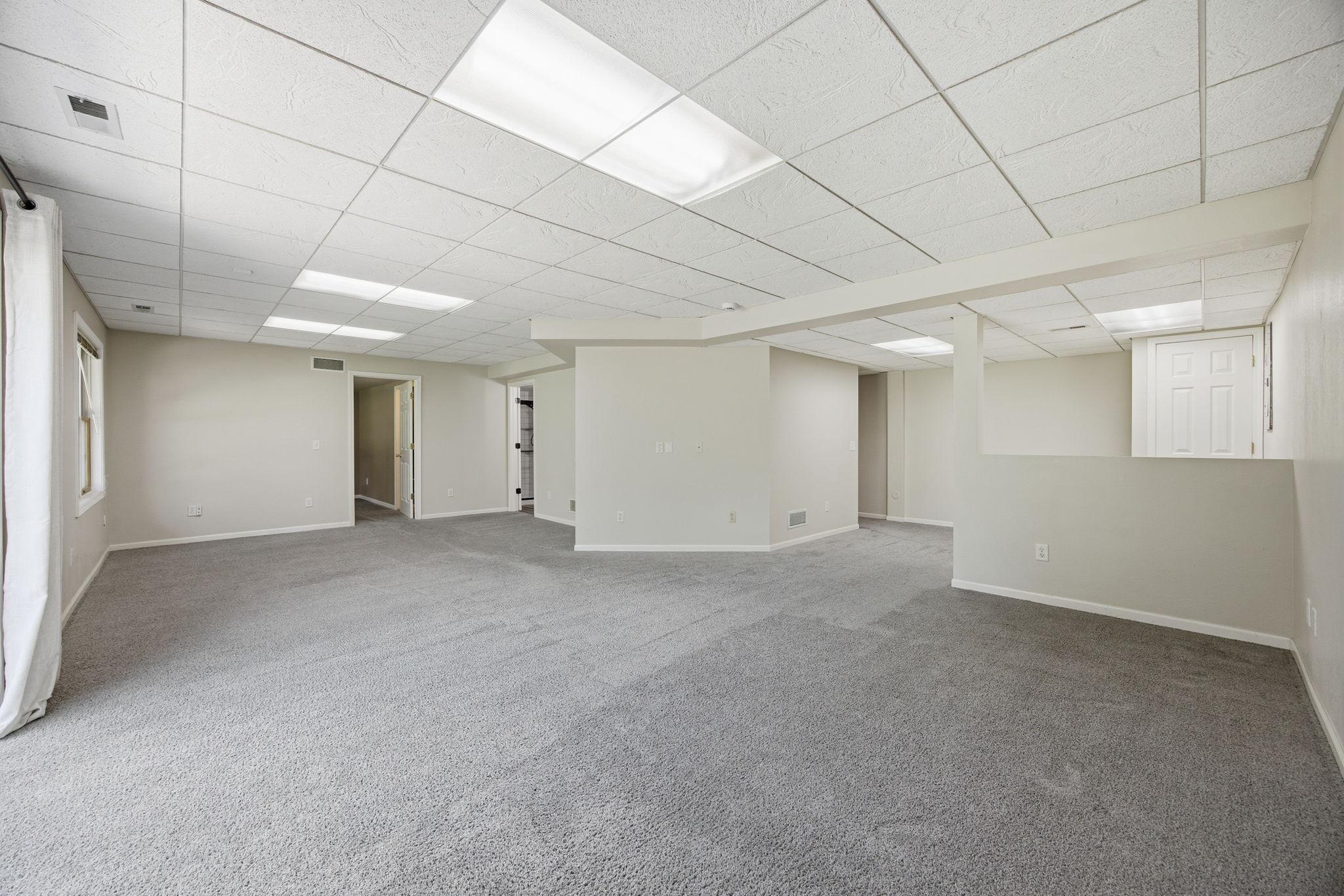 Family Room Lower Level Additional View 14325 Quince St NW Andover.jpg