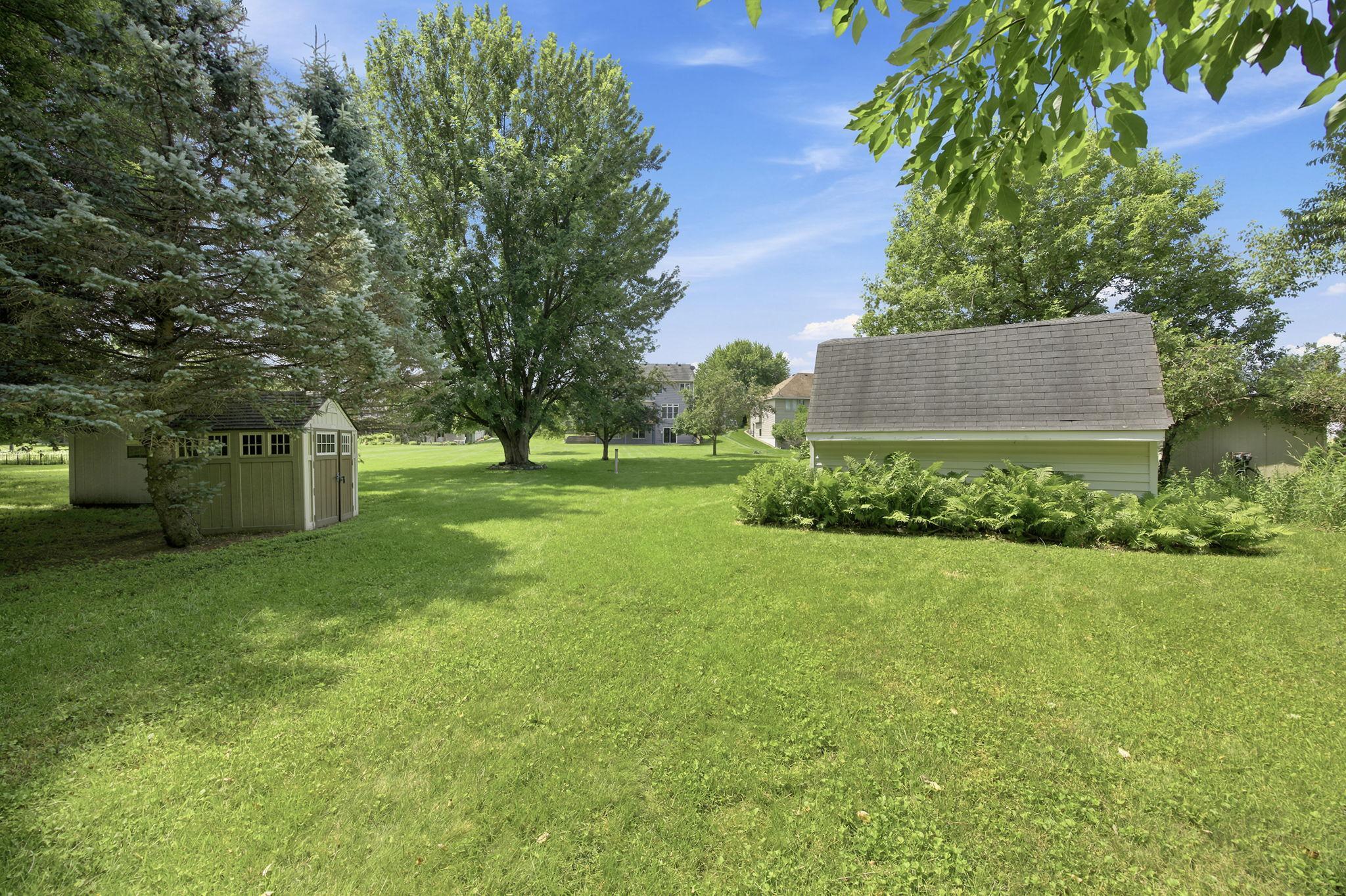 Backyard toward the house 14325 Quince St NW Andover.jpg
