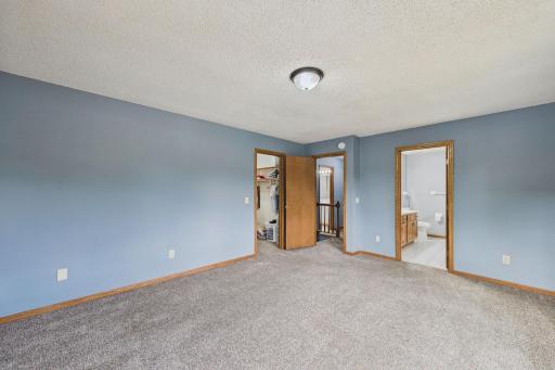 Nice sized primary bedroom with bathroom and walk in closet