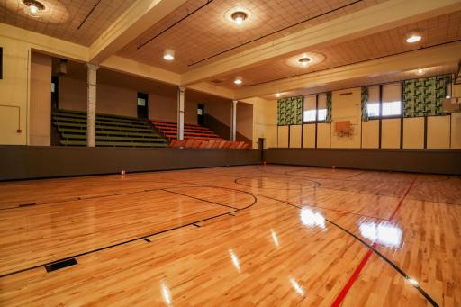 Full size gymnasium makes a great rec space for residents!