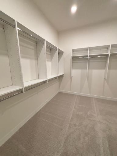 Huge main bedroom suite walk-in closet with built-ins