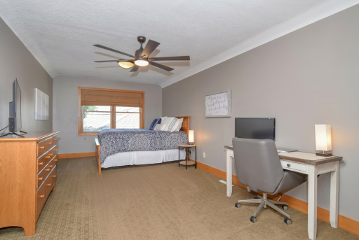 Upper level bedroom #2 (Bonus room) with ceiling fan