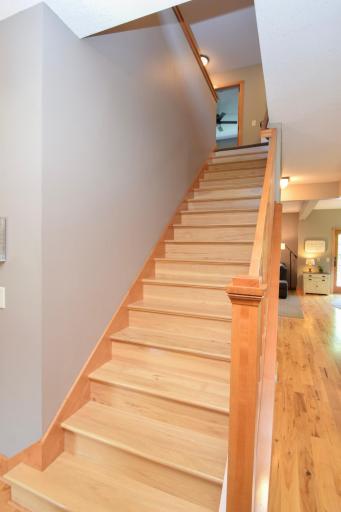 Pretty Hickory hardwood stairwell to upper level