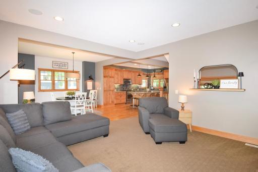 Open and inviting living, dining, and kitchen areas
