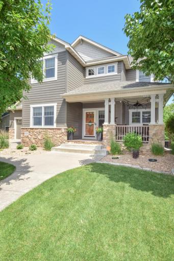 Front sidewalk to entrance of home and front porch