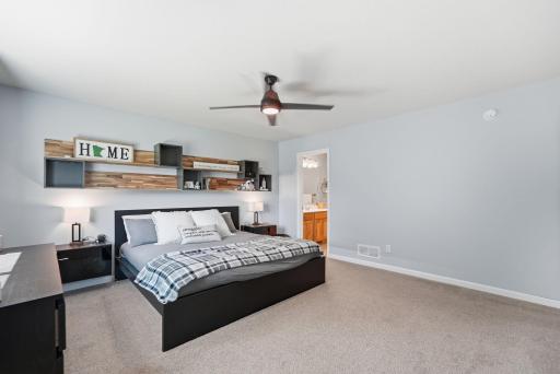 Main floor primary bedroom with full bath, additional walk-in closet.