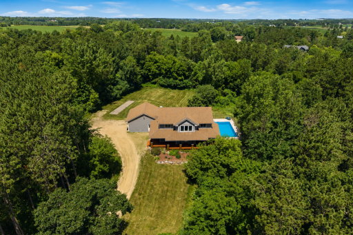 Private acreage and heated, in ground pool!