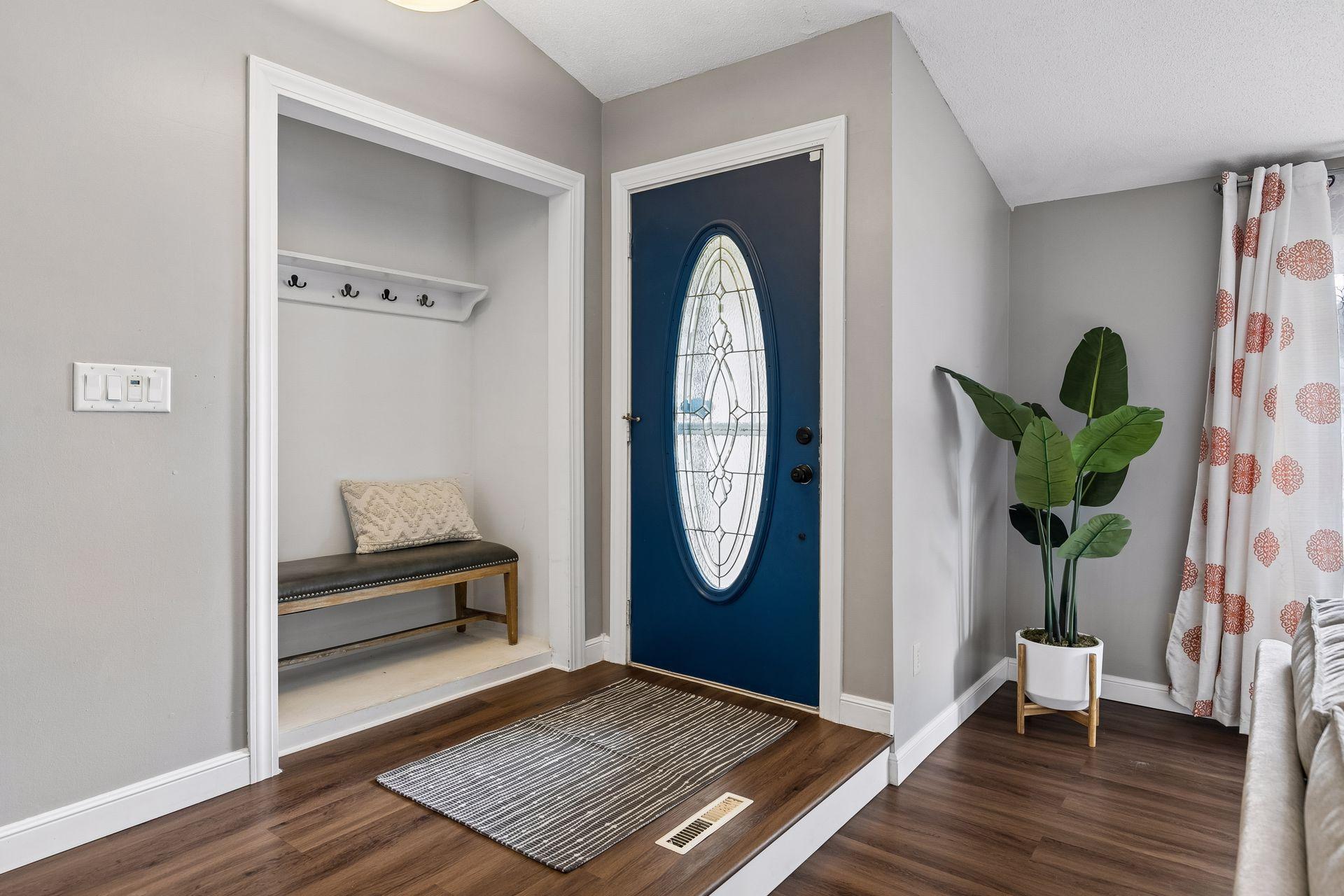 A welcoming front entry with room for guest coats