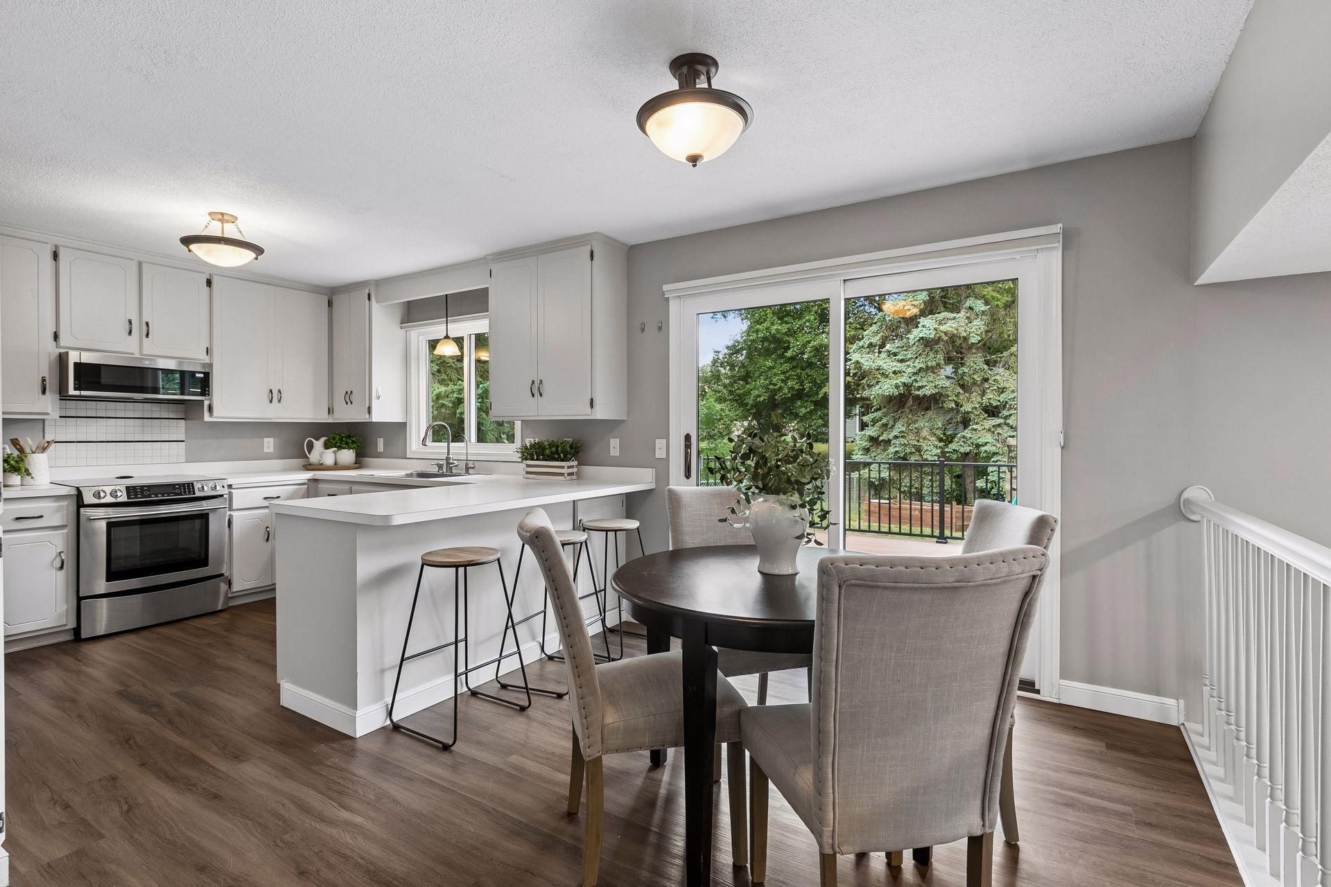 Eat-in Kitchen with great view of backyard and access to deck/patio.