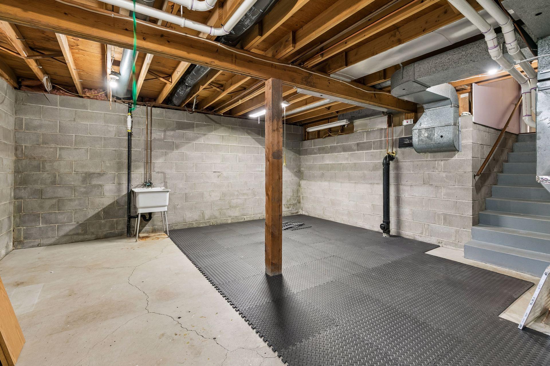 unfinished Lower Level offers great storage or flex space!