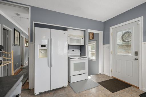 Kitchen 3 - This door is used as primary entrance to home, located on the deck