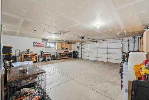 Spacious oversized garage. Custom cabinetry