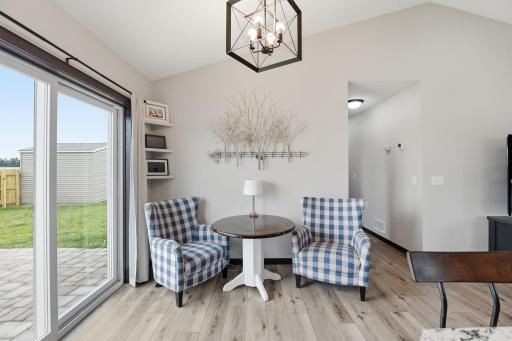 Dining Rooom Area-Patio Door leads to paver patio and private fenced in backyard