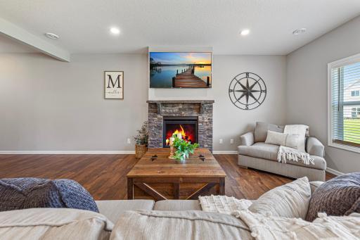 Gas fireplace in living room, TV mount conveys with home.