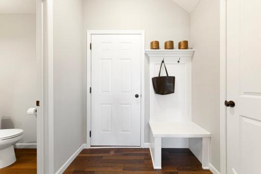 Garage Entry with built in bench and shelves