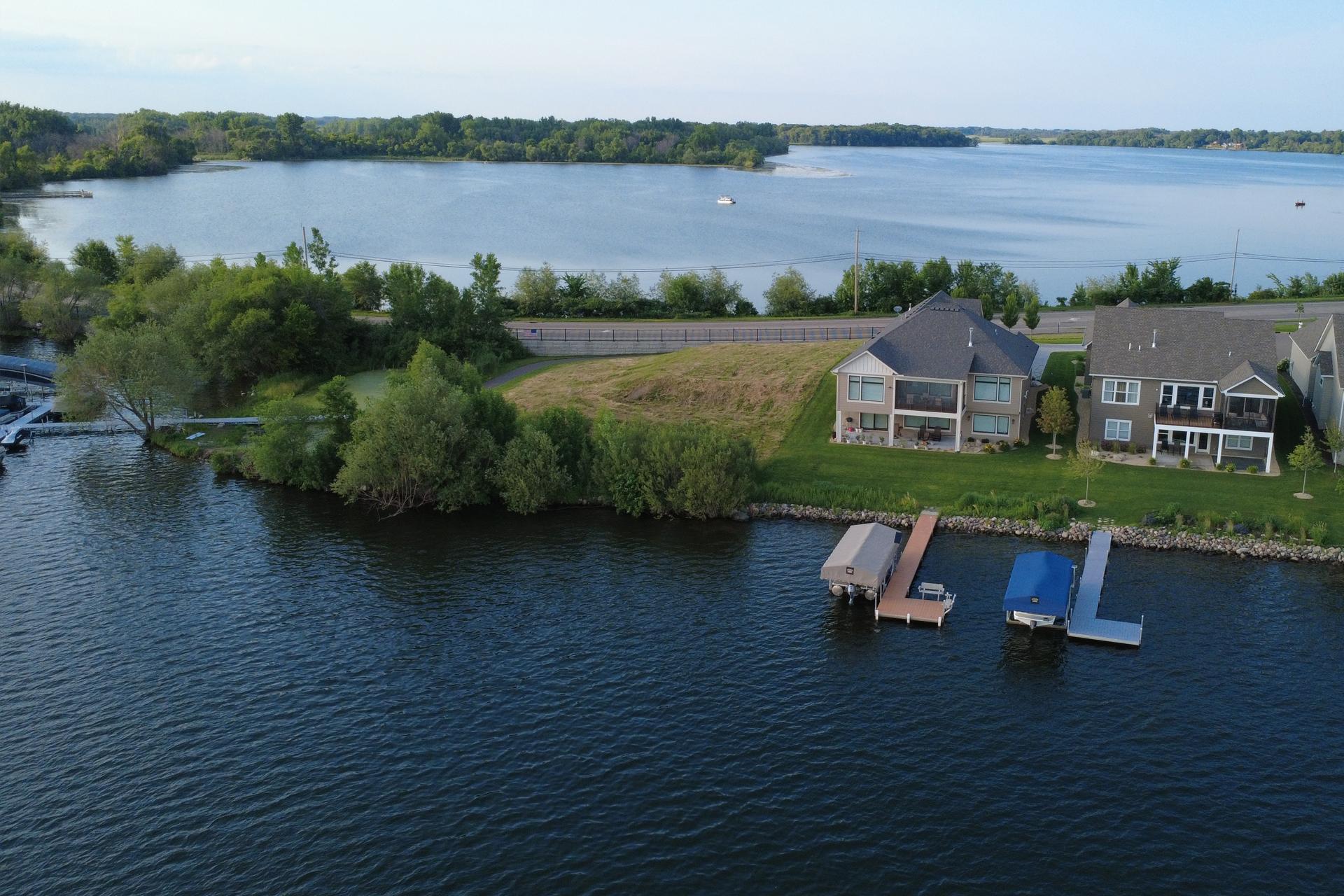 118 ft of shoreline on Centerville Lake. Treeline can come down for a walkout, docks pictured are neighboring homes.