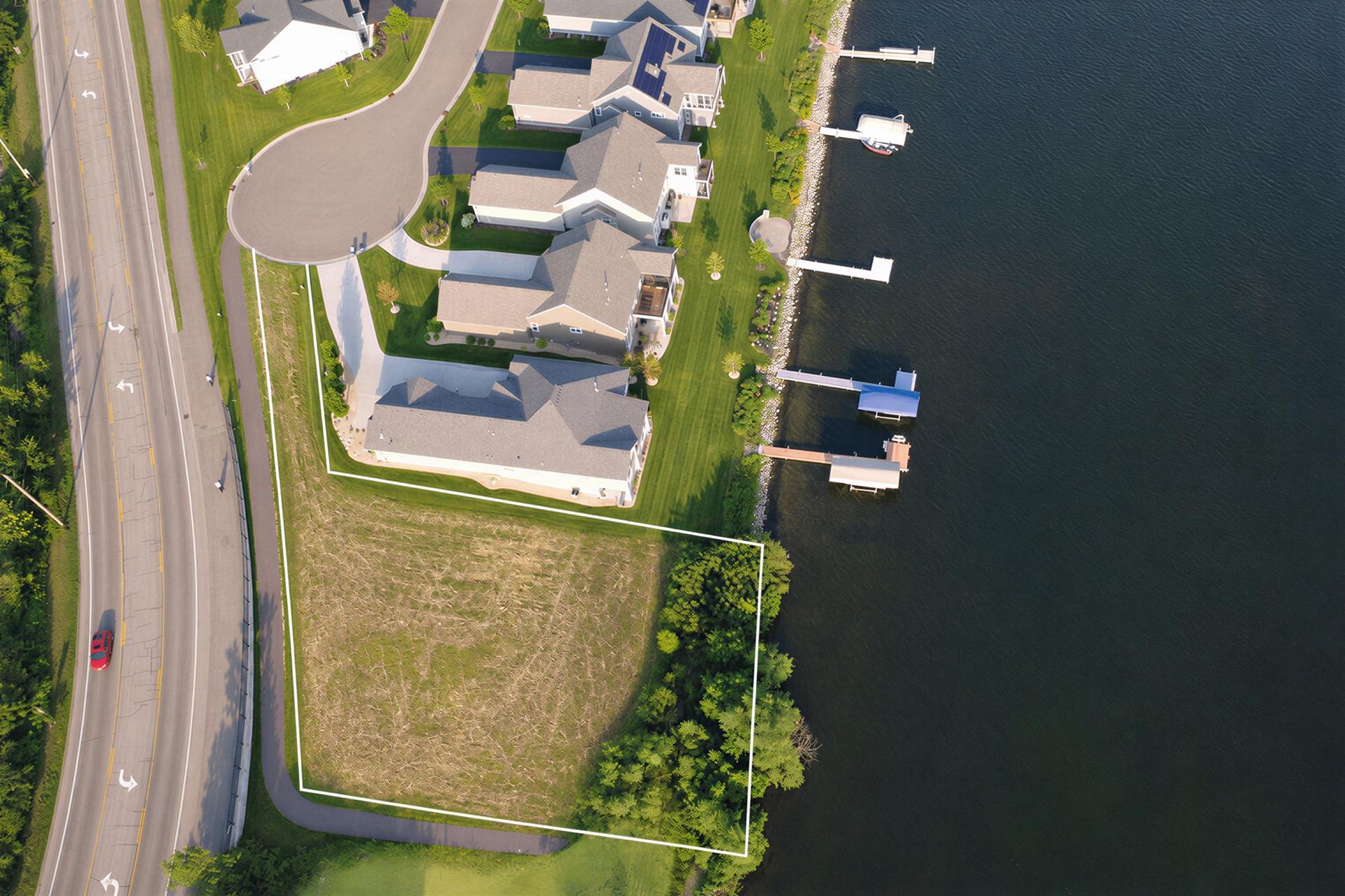 Overhead view of the lot, 0.59 acres and 25,499 sq ft, with 118 ft of shoreline on Centerville Lake. Approximate lot lines shown for illustration only.