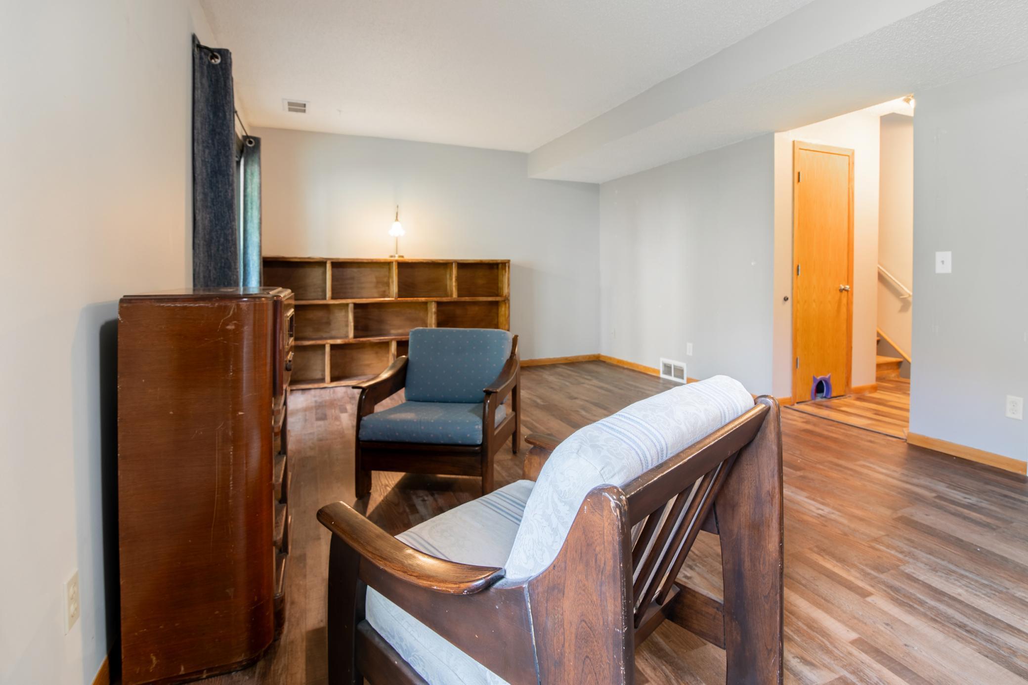 The closet under the stairs provides ample storage, or (as seen by the cat door) can be used as a litter box area that's out of sight. The current owner has not had pets during their time here.