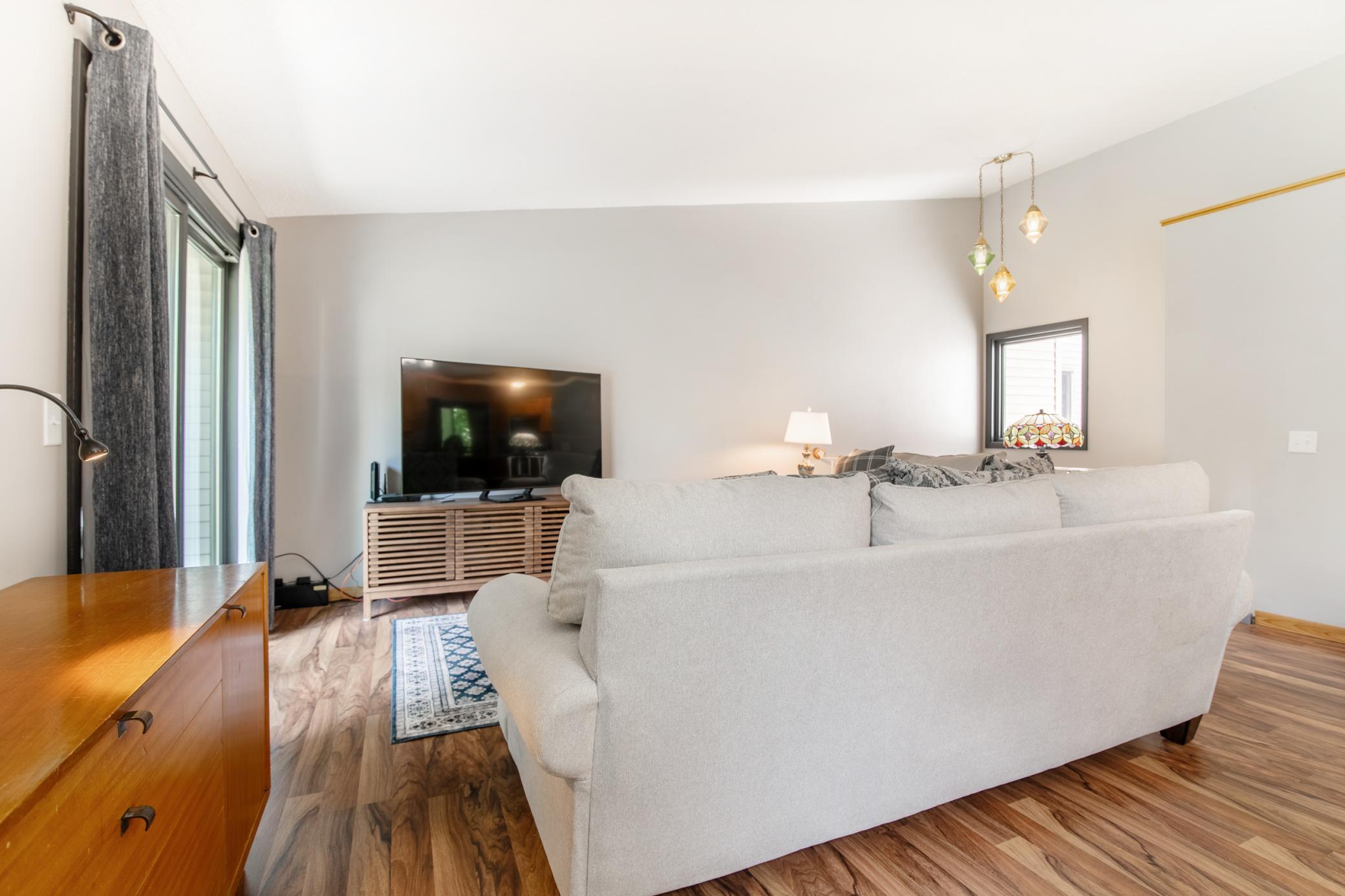 A large sliding door and transom window provide great light any time of day.