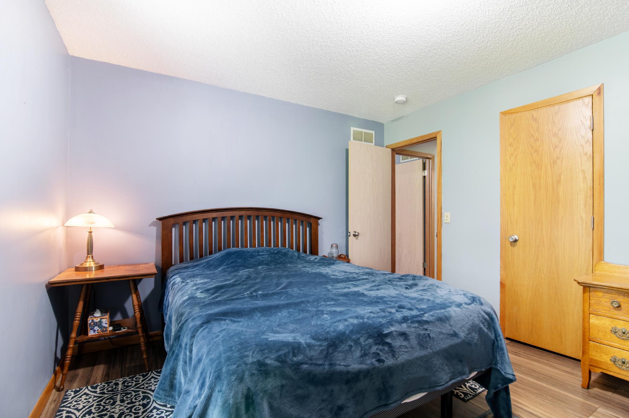 The near door is the walk-in closet. Hallway doors have been recently replaced and are ready to be finished to your tastes.