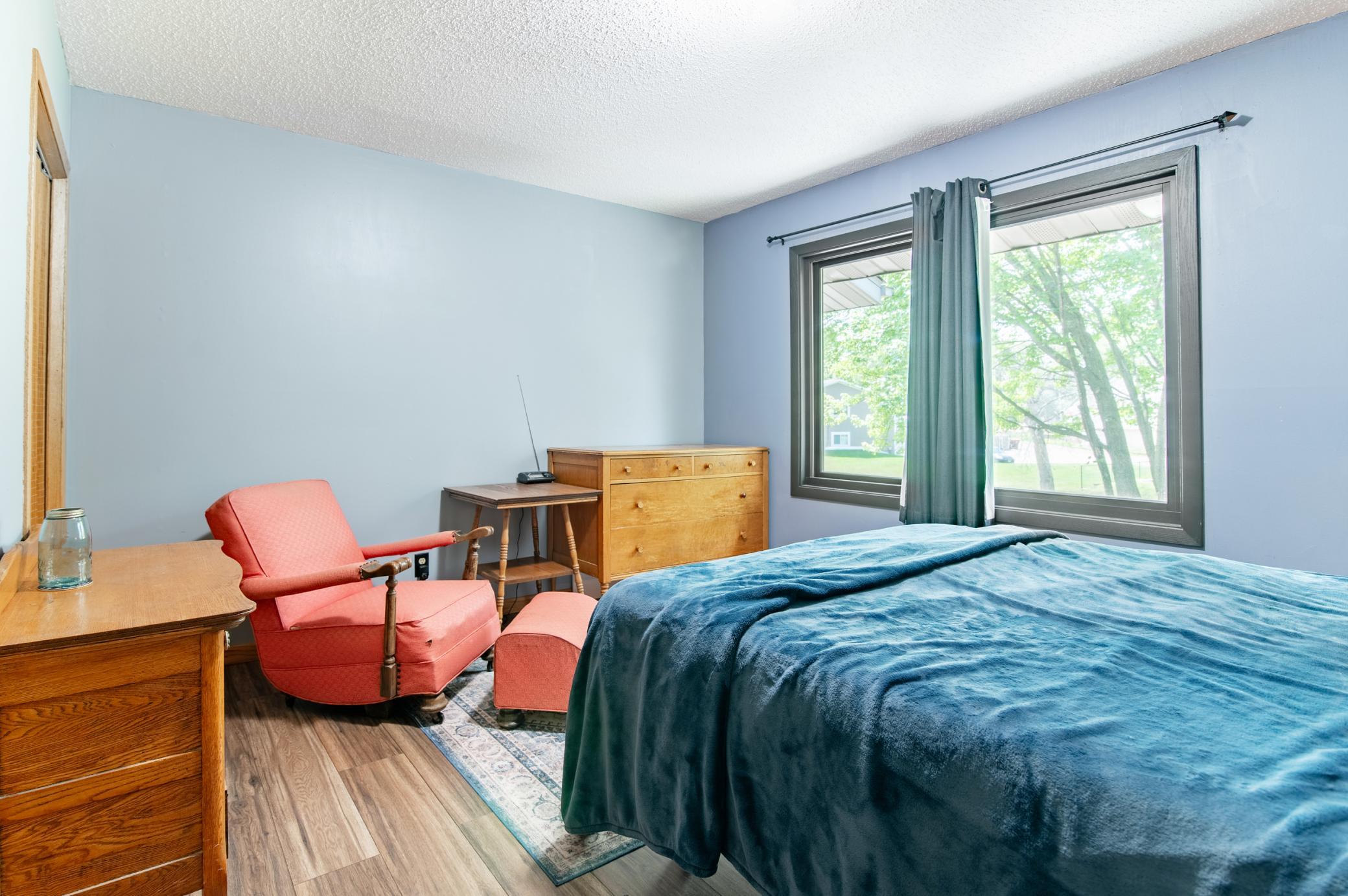 The larger of the two bedrooms includes a walk-in closet and measures more than 11 by 13 feet. Like the other bedroom, the windows face South-Southwest.
