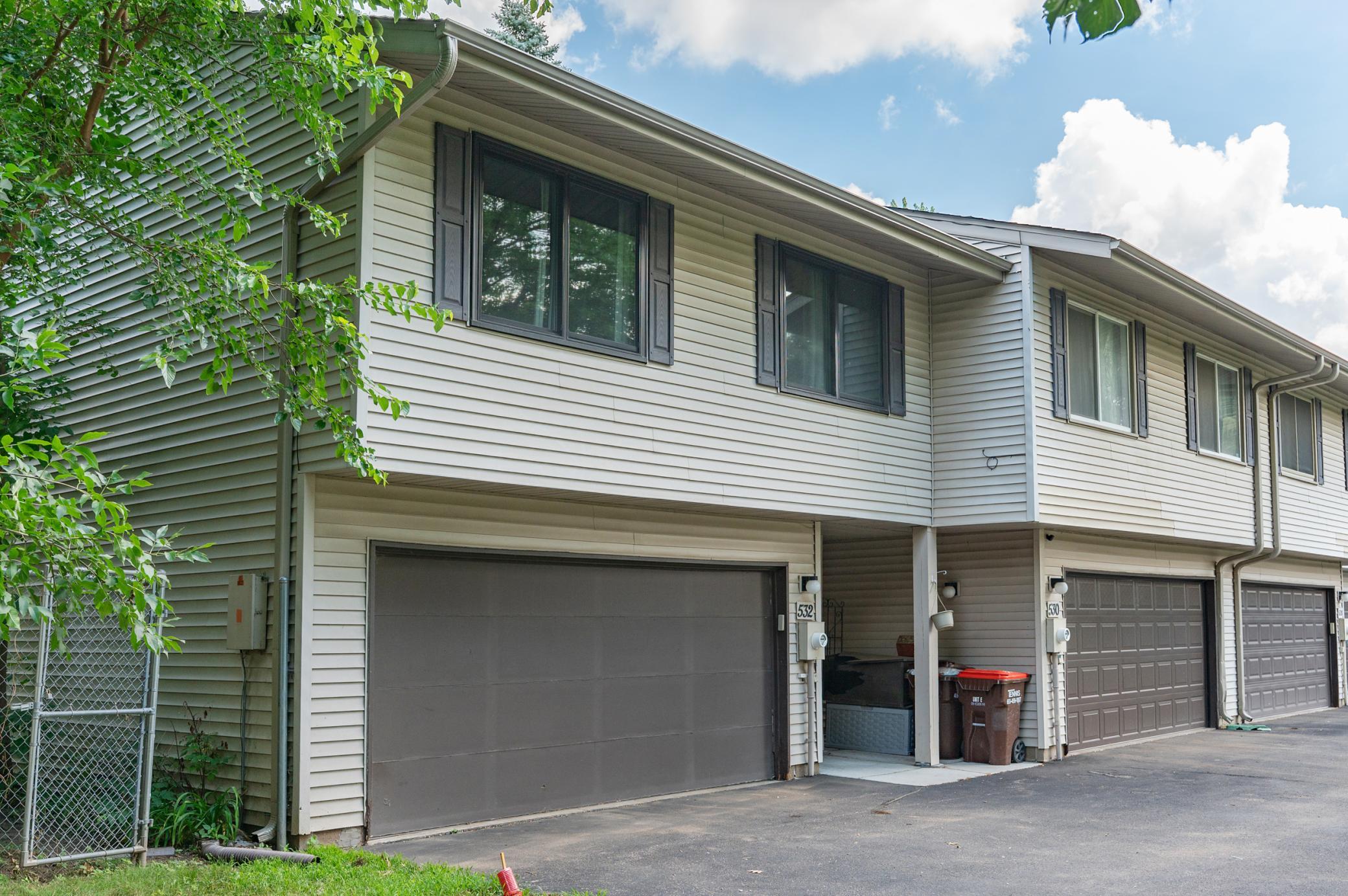 This end-unit townhome features South facing front windows for natural light and the campus has many mature trees.