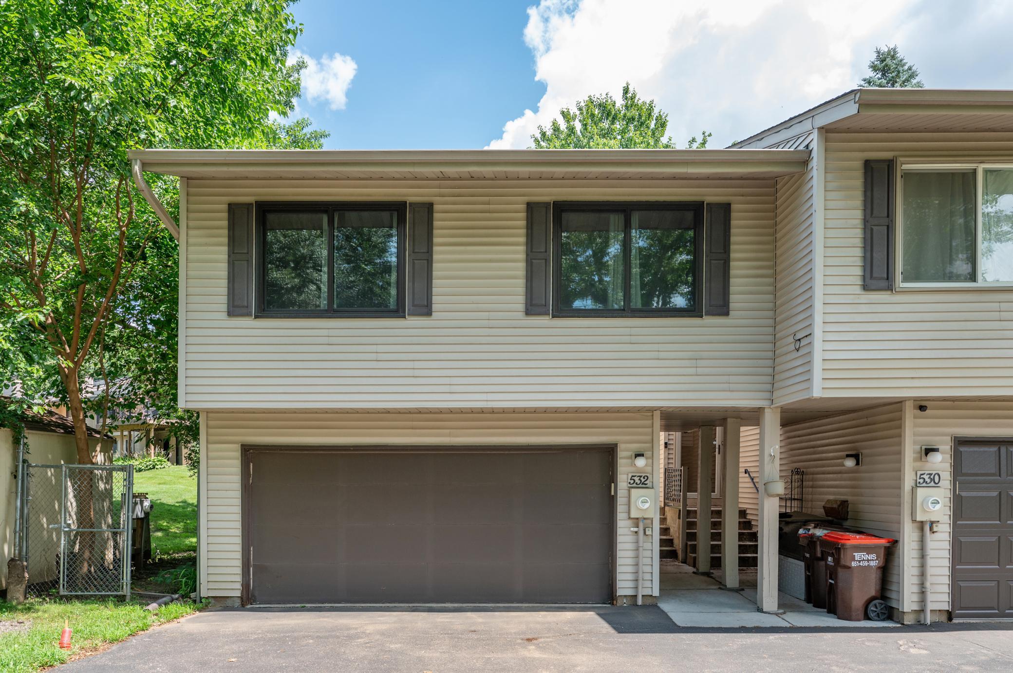 With a protected entry way and a large two-car garage, coming home never felt so nice.