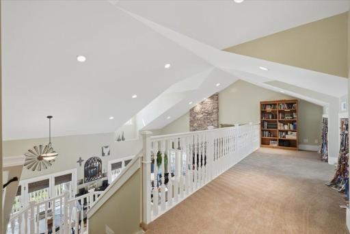 This loft area has dormers on both sides, offering plenty of natural light and views