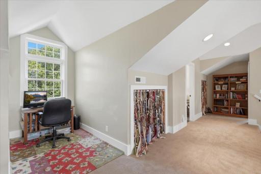 Used as an office and storage spaces currently are "forts" for the kids, this space was creatively designed and so fun